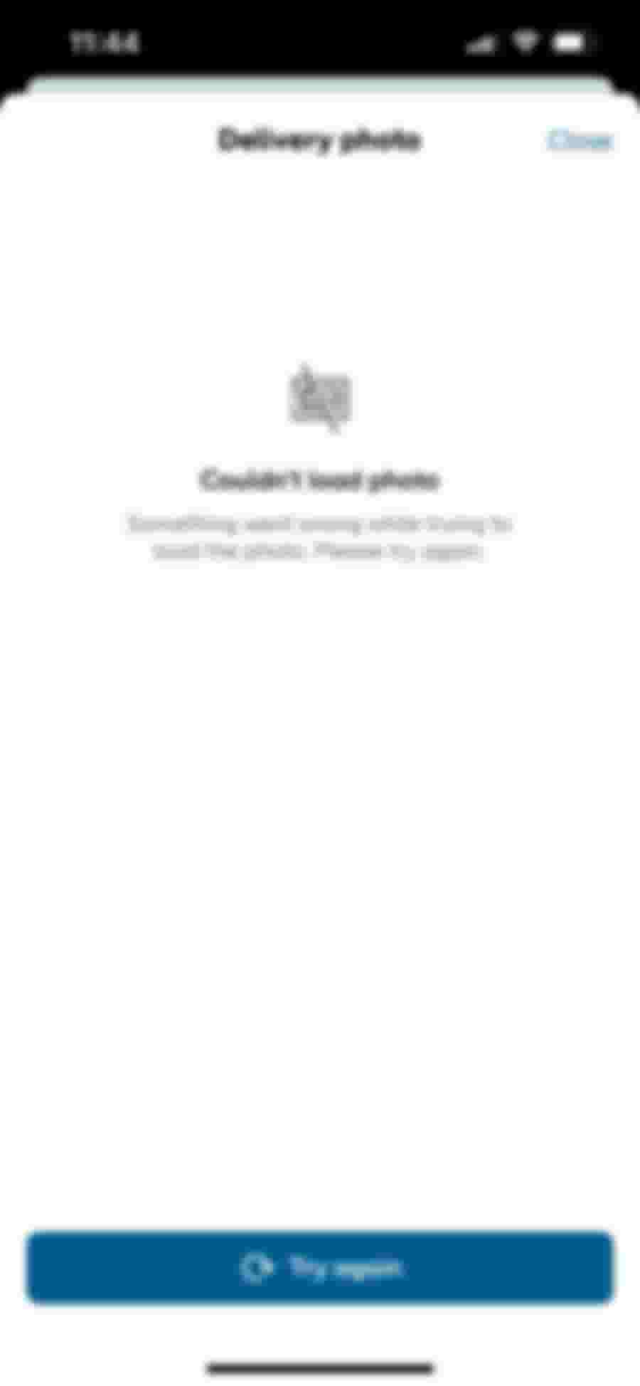 Skärmbild av ett meddelande där en bild inte kunde laddas. Texten föreslår att försöka igen.